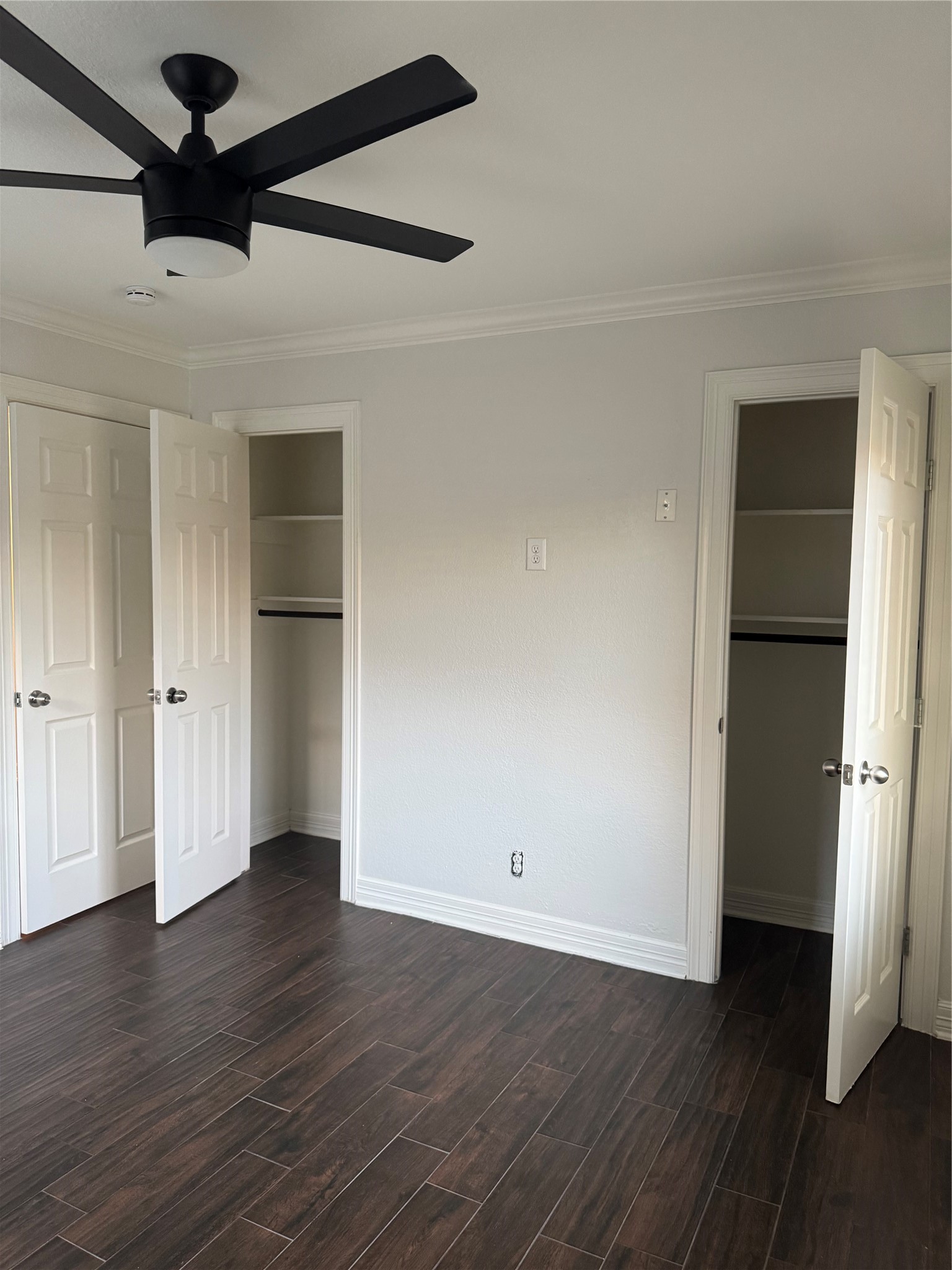 534 Sulphur Street Houston, TX 77034 - Photo 45 of 46 a view of an empty room with wooden floor and a ceiling fan