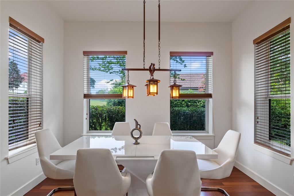 16940 Apopka Springs Boulevard Montverde, FL 34756 - Photo 14 of 36 a view of a dining room with furniture window and outside view