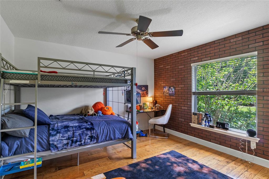 16940 Apopka Springs Boulevard Montverde, FL 34756 - Photo 23 of 36 a living room filled with furniture and a window