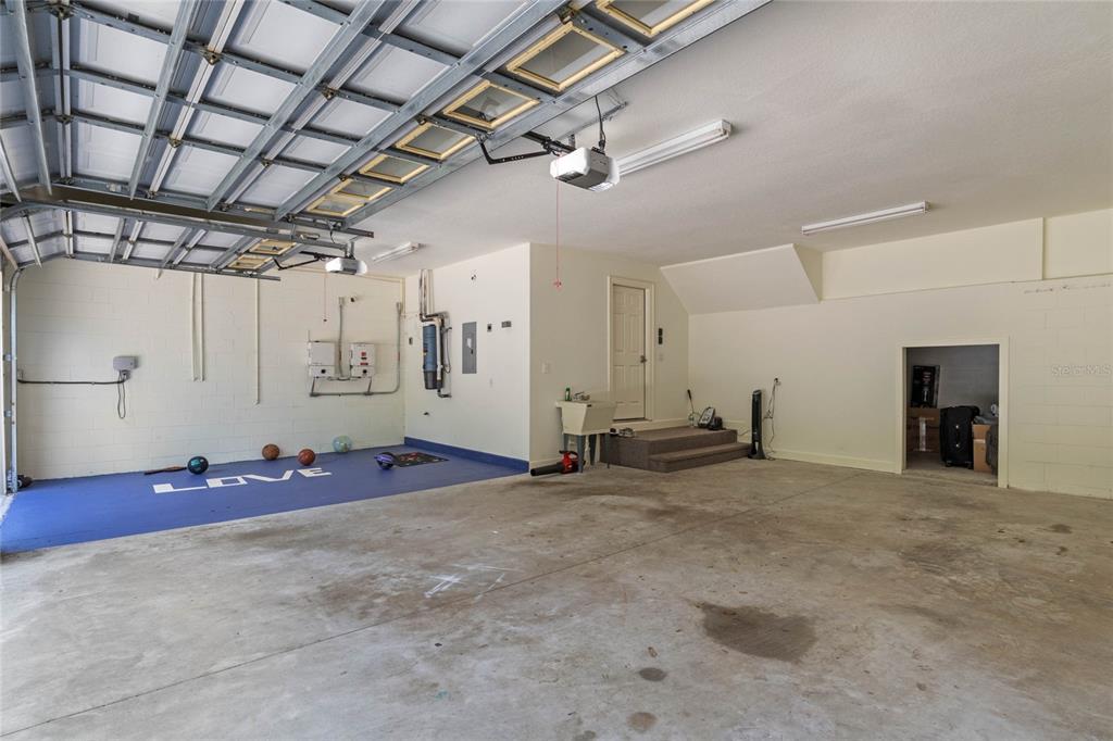 16940 Apopka Springs Boulevard Montverde, FL 34756 - Photo 34 of 36 a view of a room with gym equipment