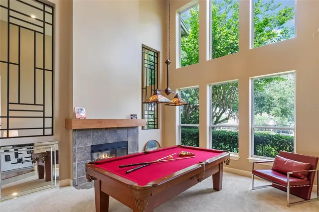 a pool with a table and chairs in balcony
