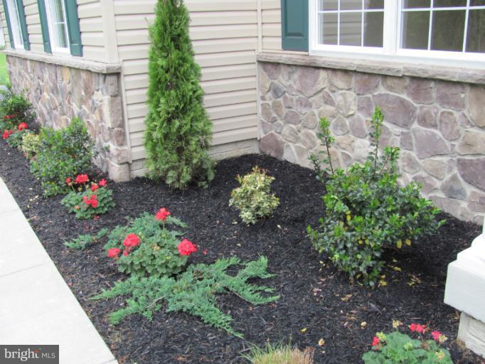 3 New Cut Road Severn, MD 21144 - Photo 14 of 22 Beautifully landscaped with partial stone front.