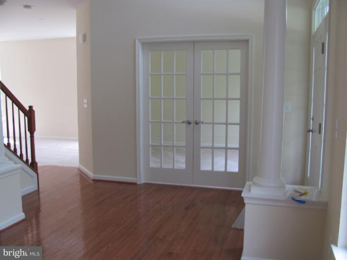 3 New Cut Road Severn, MD 21144 - Photo 17 of 22 Den with double french doors