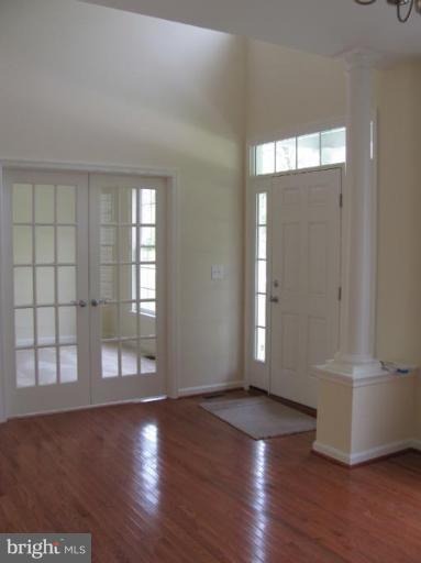 3 New Cut Road Severn, MD 21144 - Photo 3 of 22 Den/living room with double french doors.