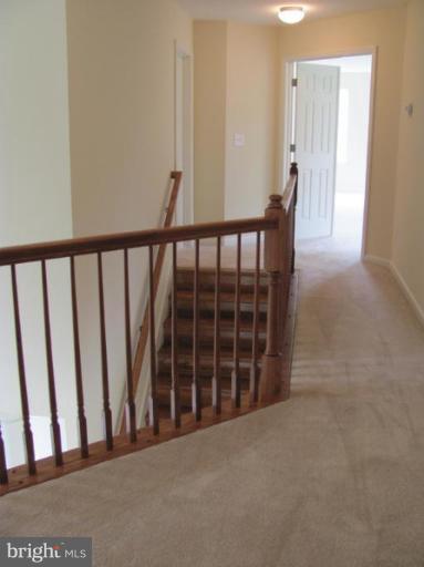 3 New Cut Road Severn, MD 21144 - Photo 4 of 22 Upstairs hallway overlooking foyer.