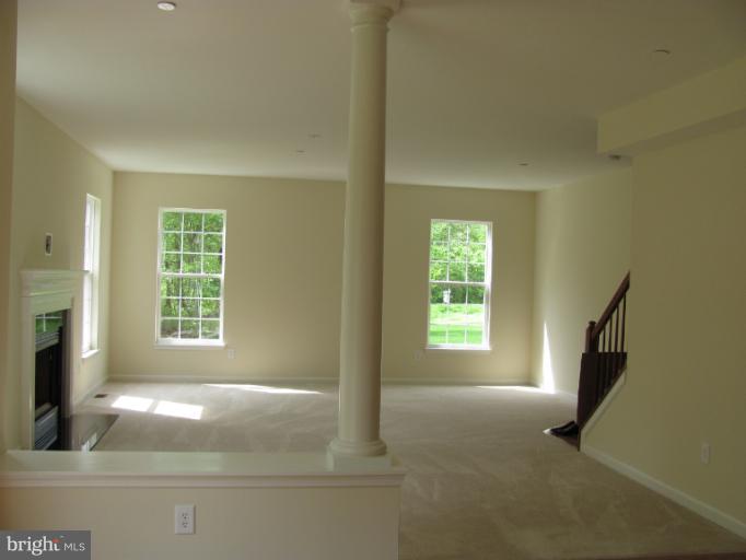3 New Cut Road Severn, MD 21144 - Photo 9 of 22 Huge family room with tons of windows.
