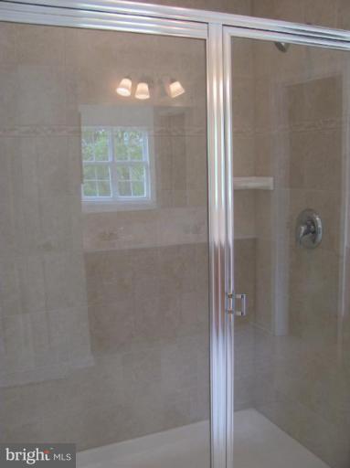 3 New Cut Road Severn, MD 21144 - Photo 10 of 22 Deluxe super bath with upgraded ceramic tile.