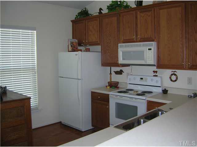 11313 Shadow Elms Lane Raleigh, NC 27614 - Photo 9 of 23 A Great Kitchen W/Pantry, Hardwood Floors, & A Breakfast Area!