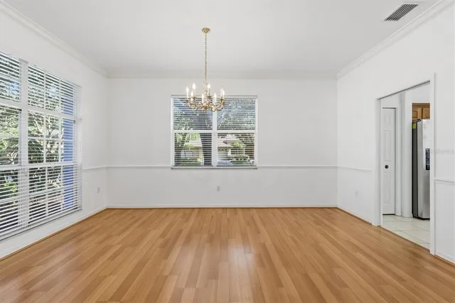 a view of a hallway with white walls