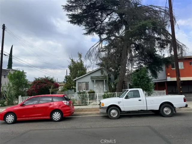 a car parked in front of a house