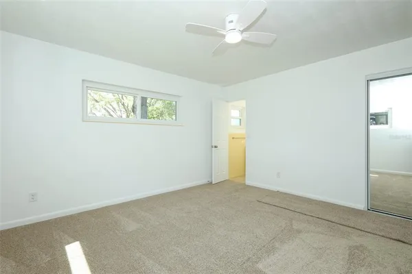 an empty room with a bathroom