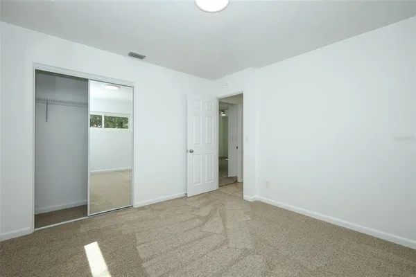 a view of a livingroom and entryway