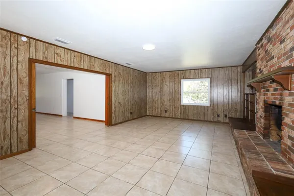 a view of an empty room and window