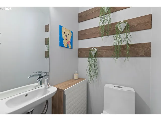 a bathroom with a sink and mirror