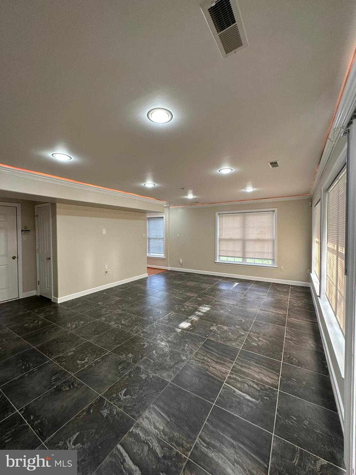 5409 Commerce Row, Unit 49 Bowie, MD 20720 - Photo 4 of 22 a view of an empty room with windows
