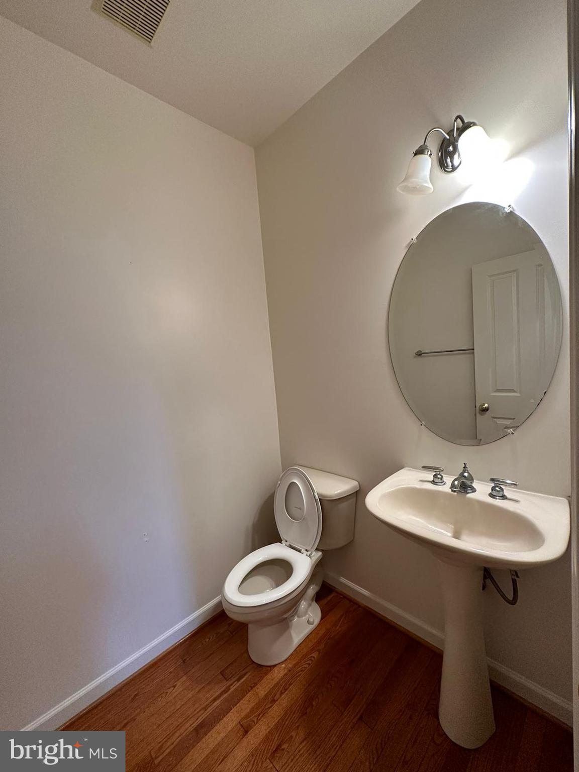5409 Commerce Row, Unit 49 Bowie, MD 20720 - Photo 10 of 22 a bathroom with a sink and a mirror