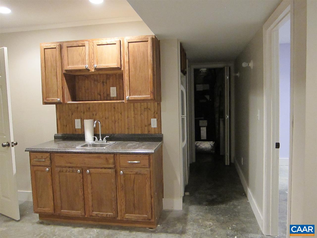 4176 Rising Sun Road Palmyra, VA 22963 - Photo 20 of 26 a bathroom with a granite countertop sink and a mirror