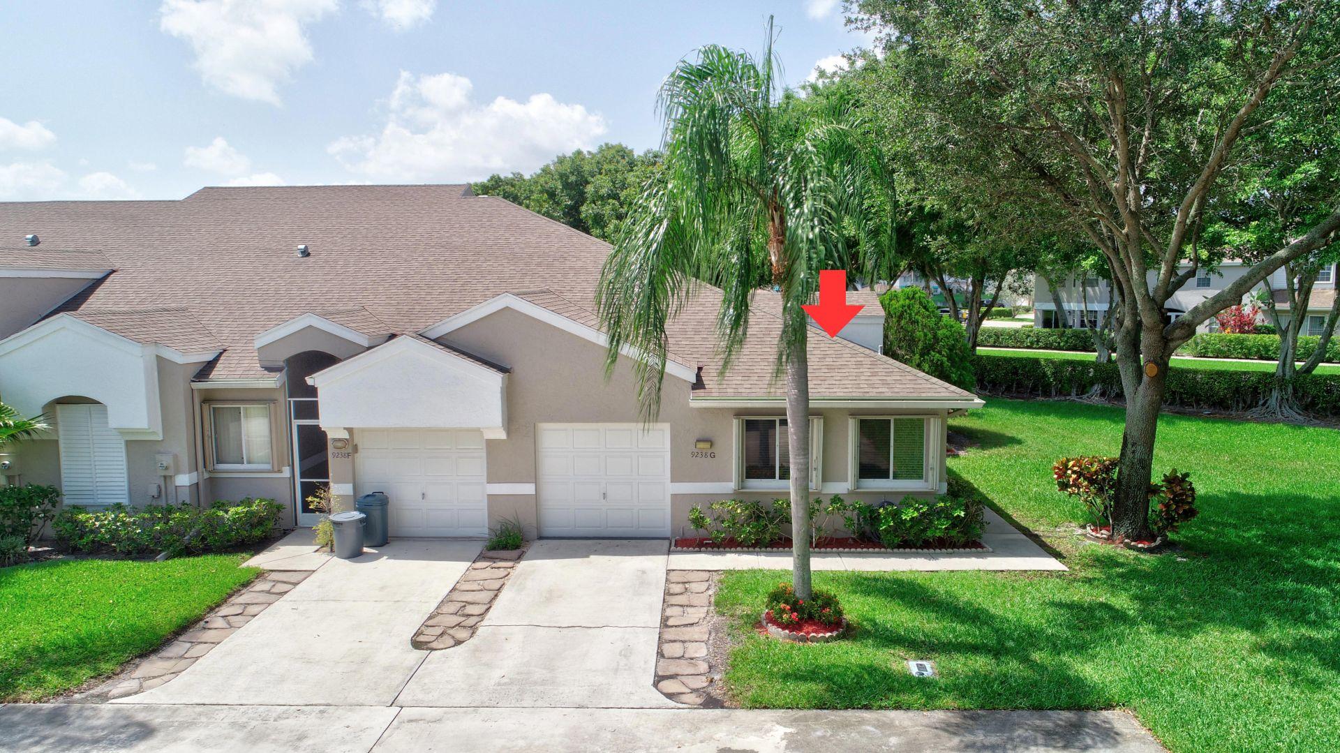 9238 Vineland Court, Unit G Boca Raton, FL 33496 - Photo 1 of 42 a aerial view of a house with yard