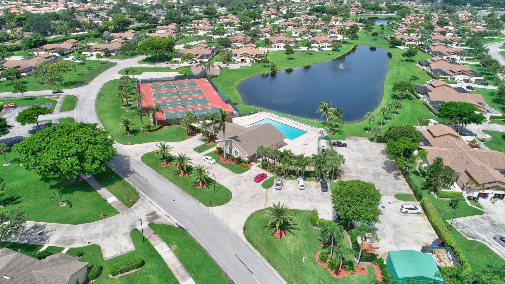 9238 Vineland Court, Unit G Boca Raton, FL 33496 - Photo 31 of 42 an aerial view of residential houses with outdoor space
