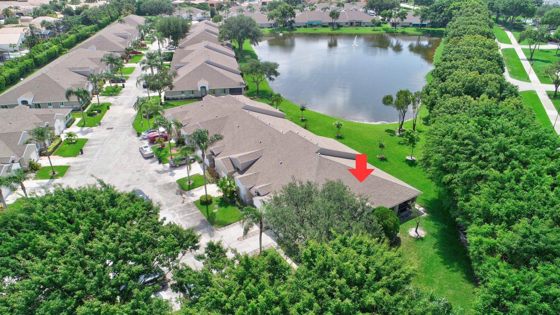 9238 Vineland Court, Unit G Boca Raton, FL 33496 - Photo 33 of 42 an aerial view of residential house with outdoor space and lake view