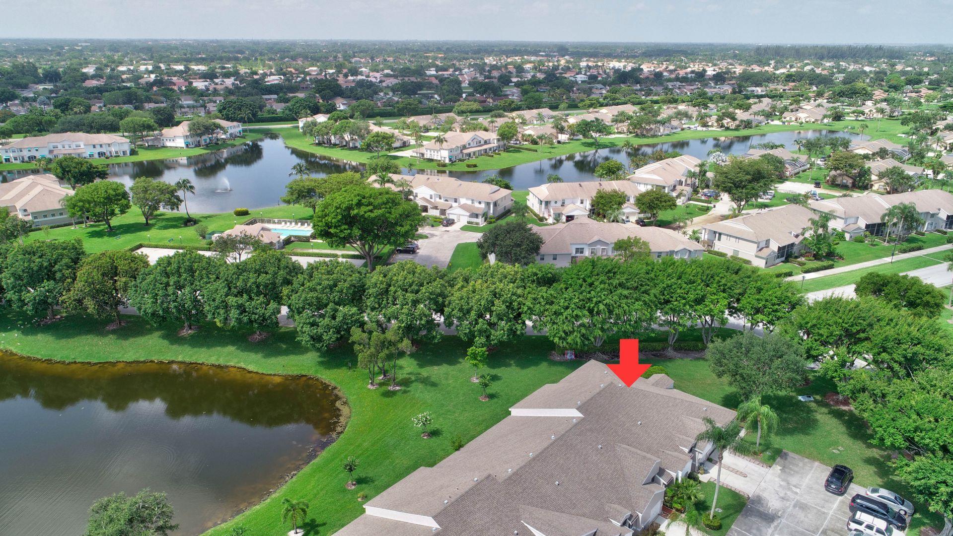 9238 Vineland Court, Unit G Boca Raton, FL 33496 - Photo 36 of 42 an aerial view of residential houses with outdoor space and lake view