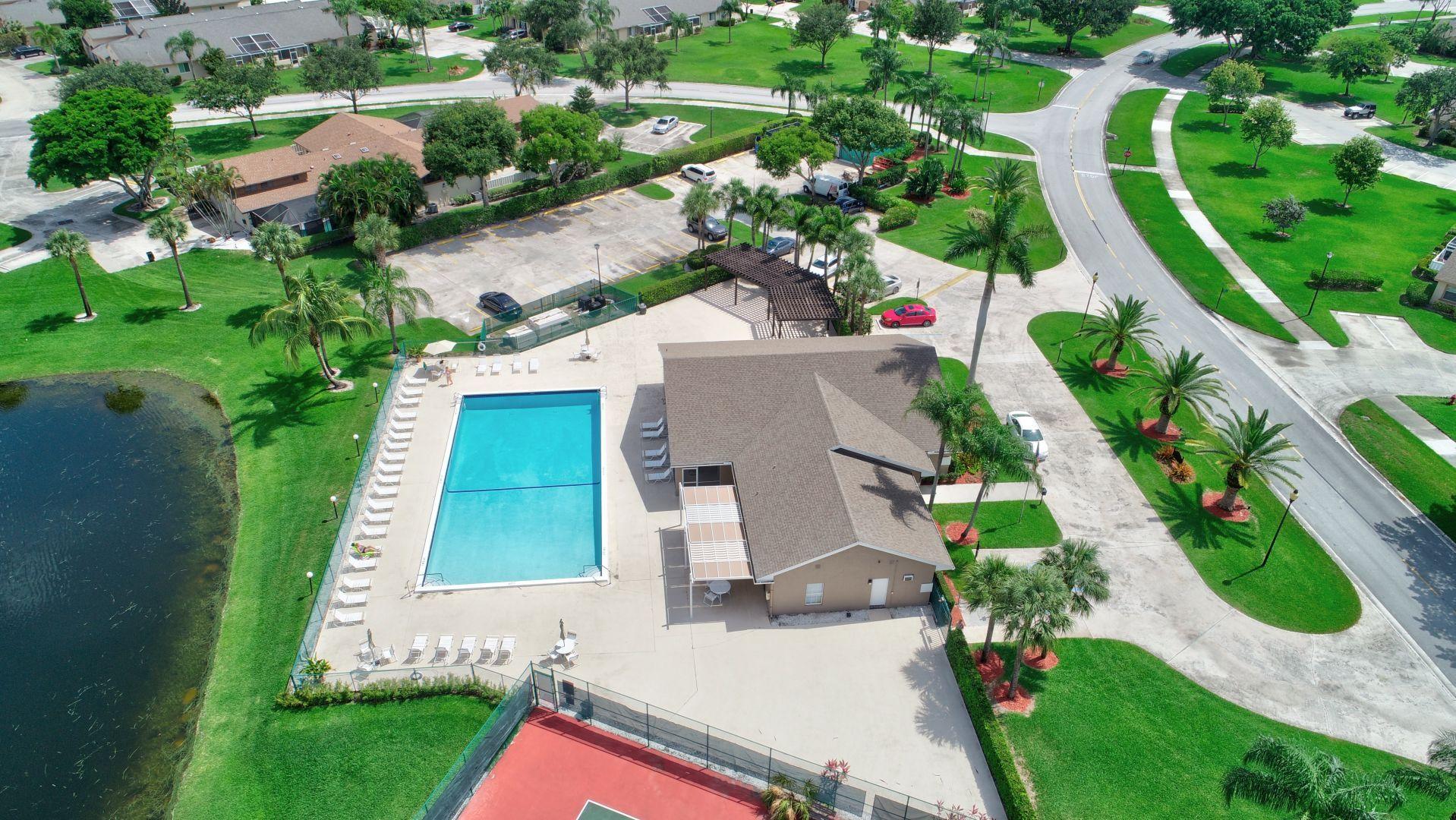 9238 Vineland Court, Unit G Boca Raton, FL 33496 - Photo 42 of 42 an aerial view of house with yard