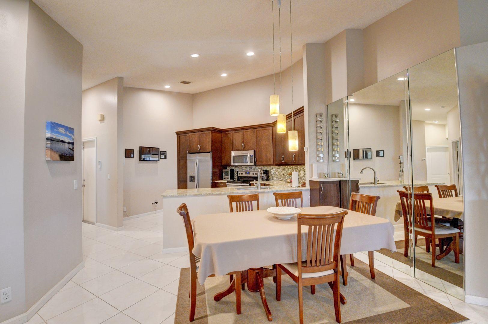 9238 Vineland Court, Unit G Boca Raton, FL 33496 - Photo 10 of 42 a view of a dining room with furniture