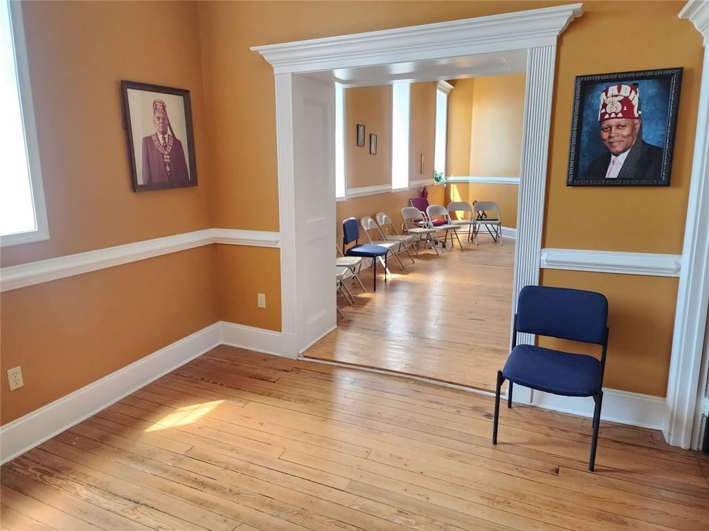 6958 Main Street Lithonia, GA 30058 - Photo 36 of 55 a living room with furniture and wooden floor