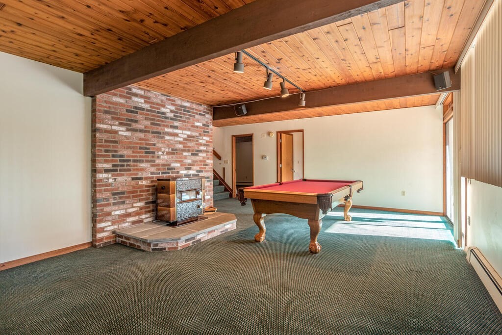 92 Leslie Road Rowley, MA 01969 - Photo 18 of 36 a room with pool table and windows