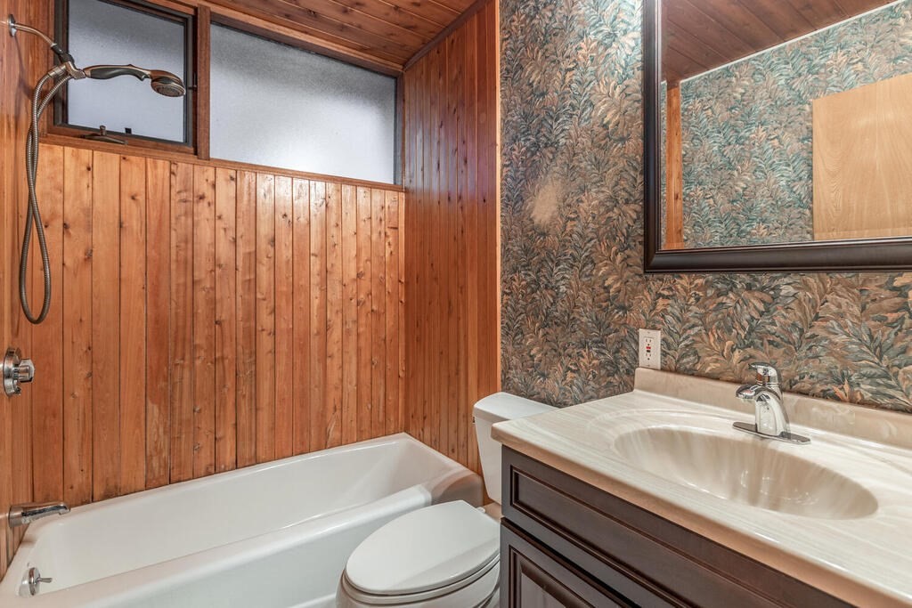 92 Leslie Road Rowley, MA 01969 - Photo 19 of 36 a bathroom with a sink toilet and shower