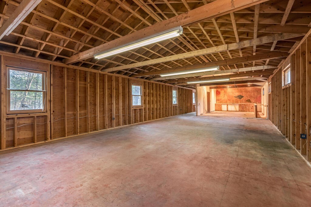 92 Leslie Road Rowley, MA 01969 - Photo 26 of 36 a view of an empty room with a garage