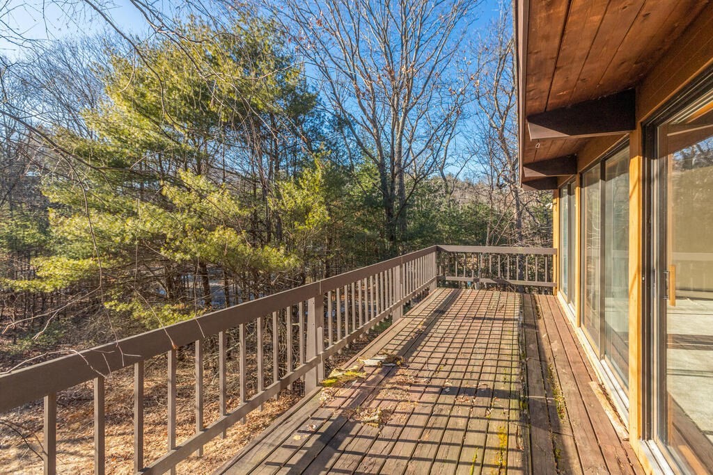 92 Leslie Road Rowley, MA 01969 - Photo 27 of 36 a view of balcony with wooden floor and fence