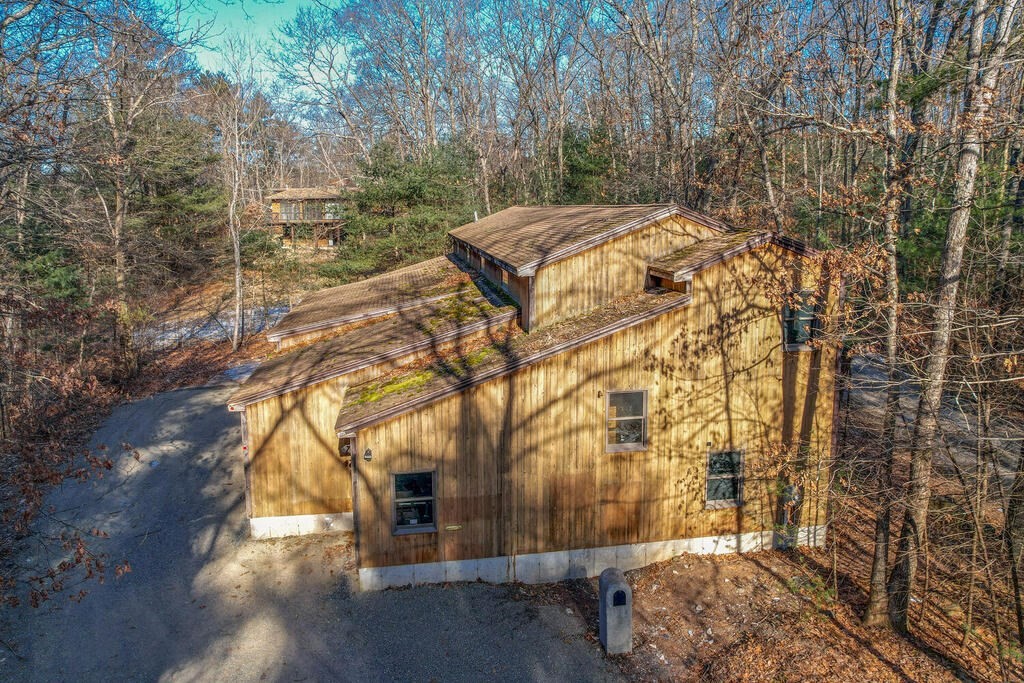 92 Leslie Road Rowley, MA 01969 - Photo 34 of 36 a view of a yard with plants and trees