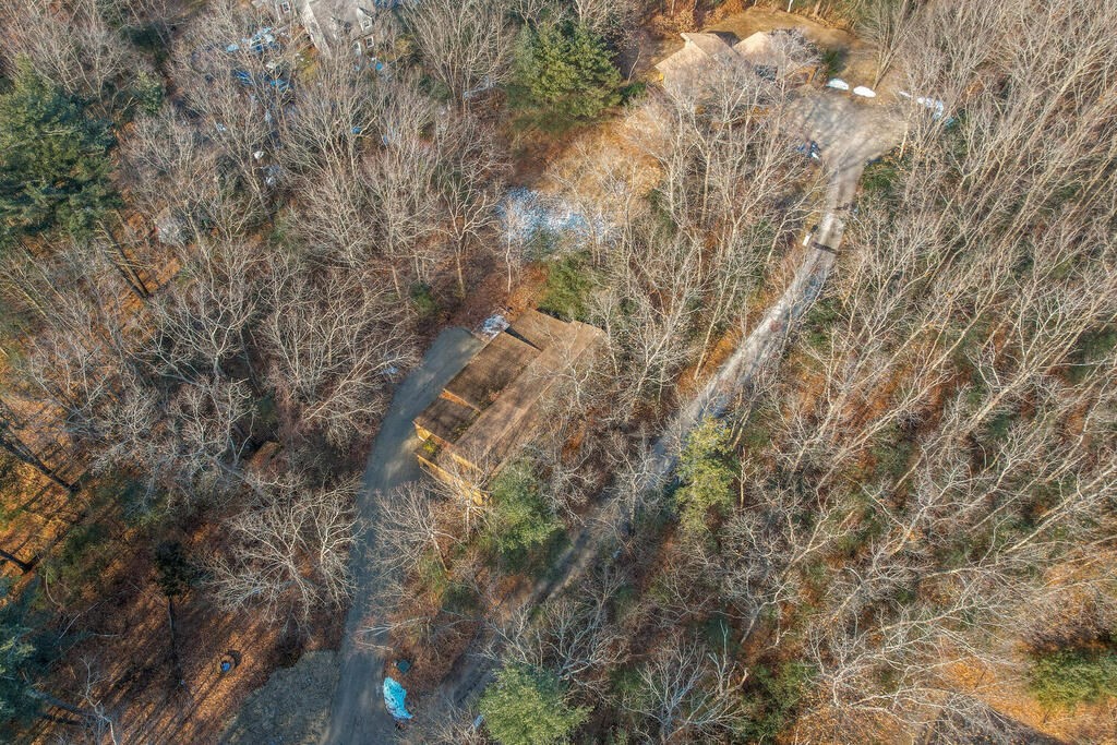 92 Leslie Road Rowley, MA 01969 - Photo 36 of 36 a aerial view of house with yard and trees