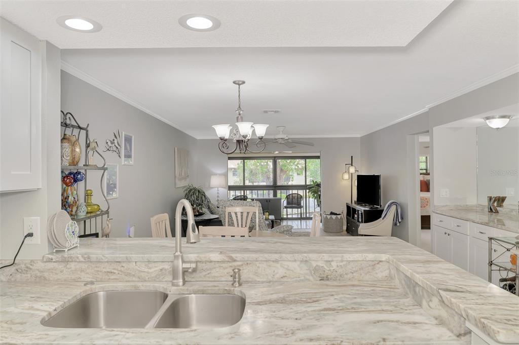 285 Mission Trail West, Unit B Venice, FL 34285 - Photo 18 of 49 a view of kitchen with sink refrigerator and window