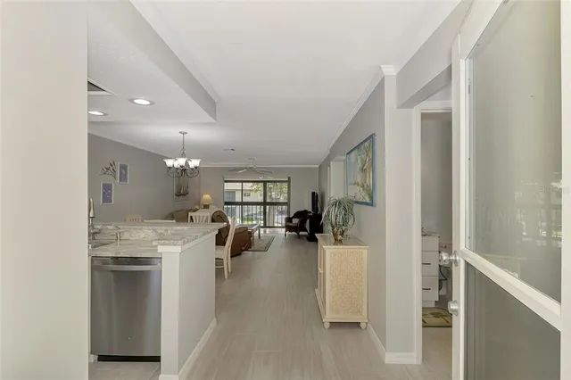 a view of a living room and entry way