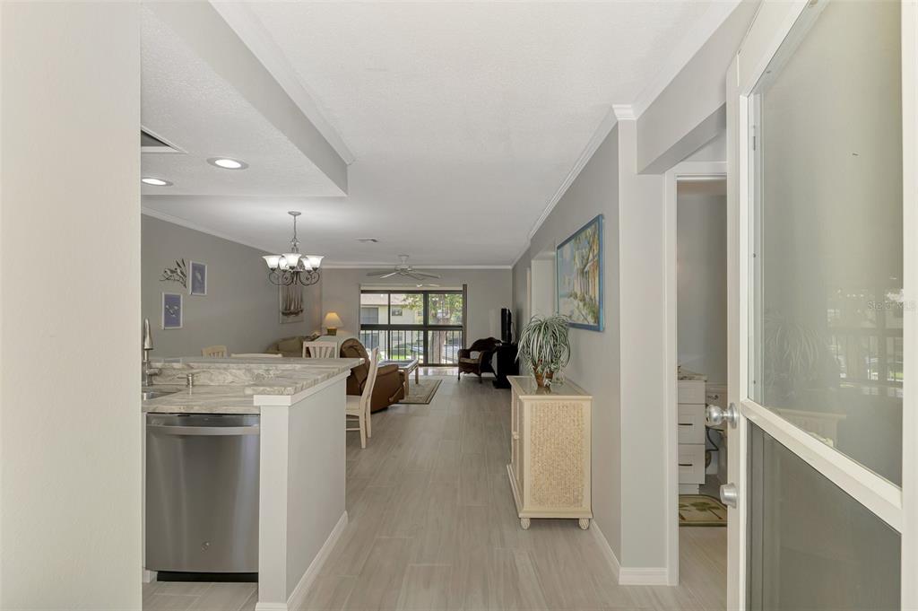 285 Mission Trail West, Unit B Venice, FL 34285 - Photo 4 of 49 a view of a living room and entry way