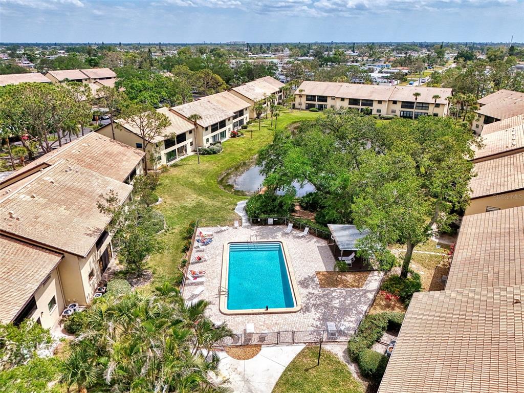 285 Mission Trail West, Unit B Venice, FL 34285 - Photo 41 of 49 an aerial view of a house with a yard