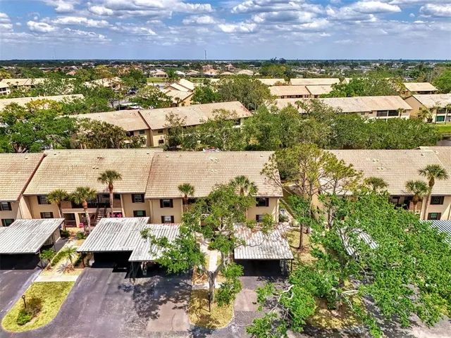 a view of lake and houses with outdoor space