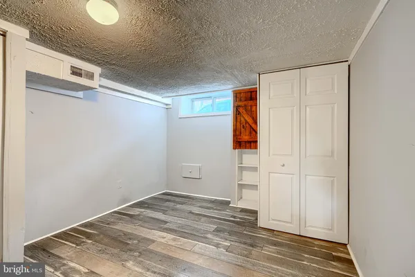 a very nice looking room with a dining table chairs and a chandelier