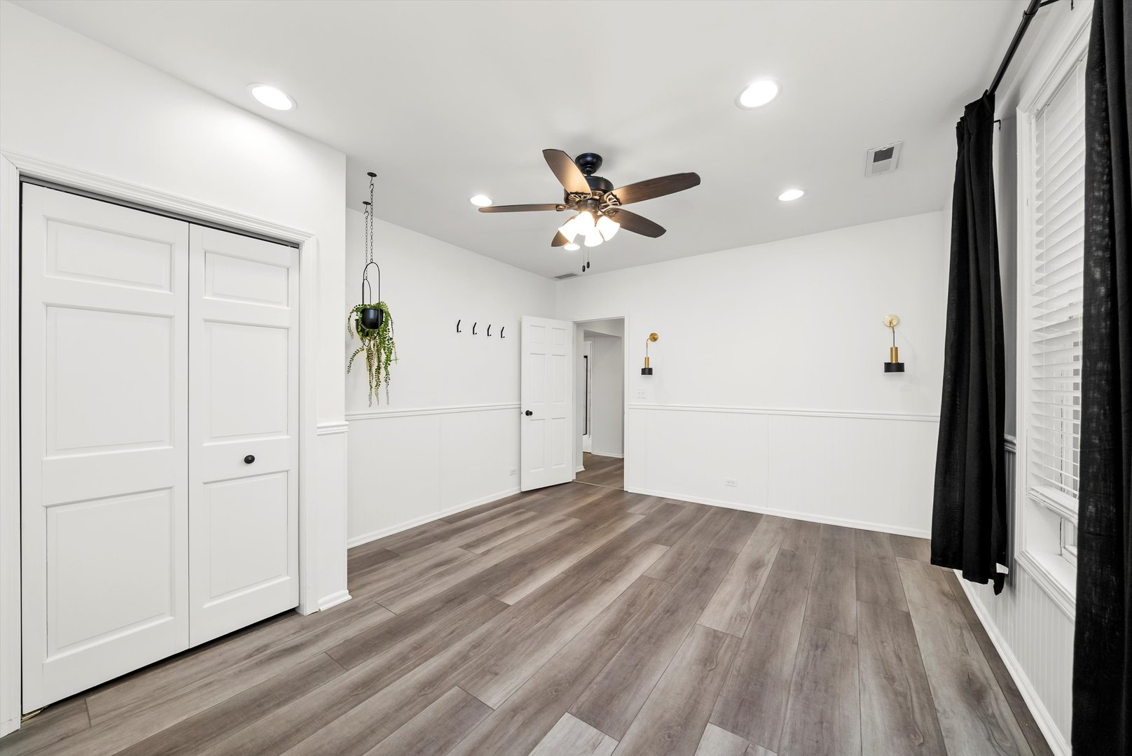 3227 South Wells Street, Unit COACHHOUSE Chicago, IL 60616 - Photo 13 of 20 wooden floor in an empty room with a window