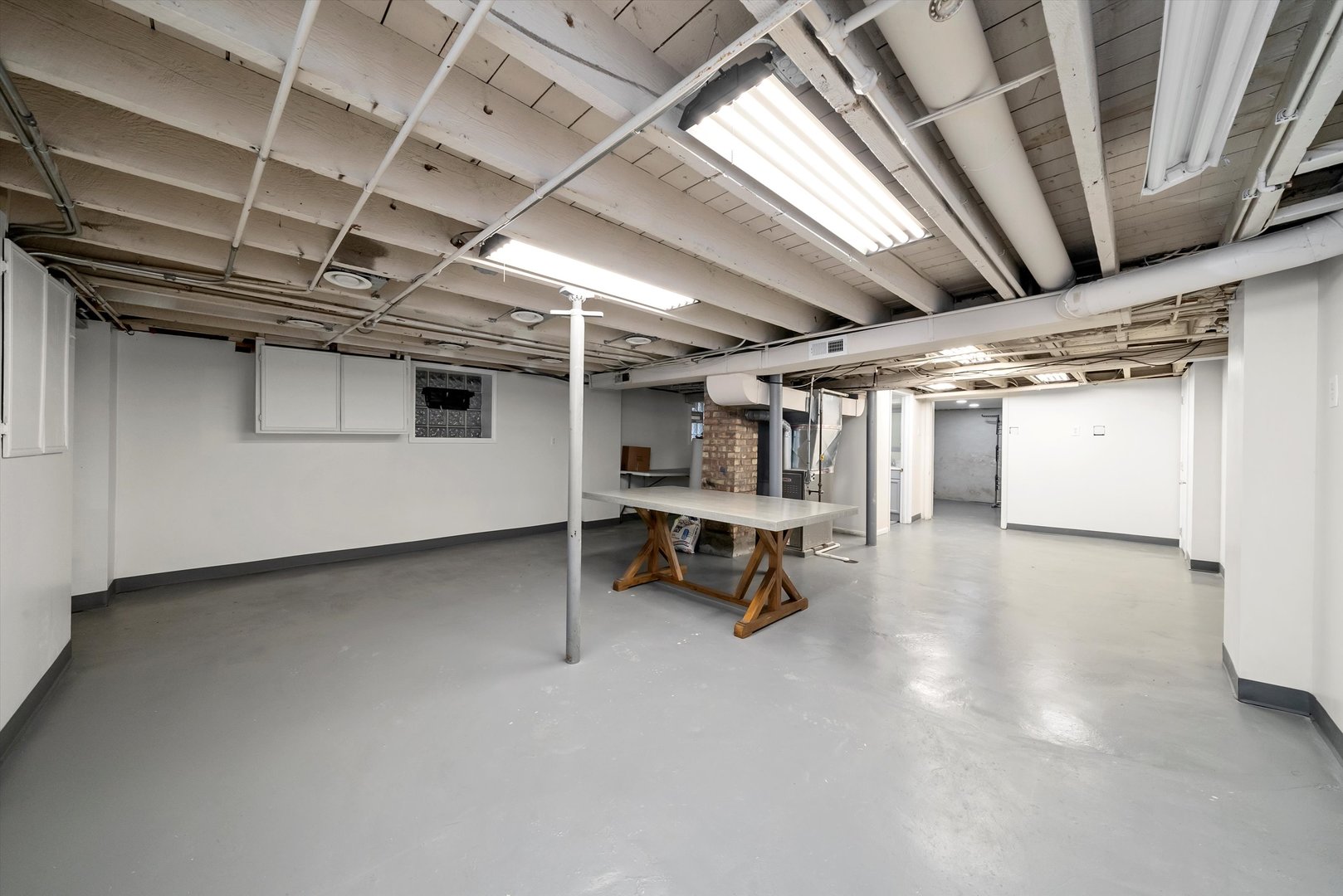 3227 South Wells Street, Unit COACHHOUSE Chicago, IL 60616 - Photo 18 of 20 a view of storage and utility room with stairs