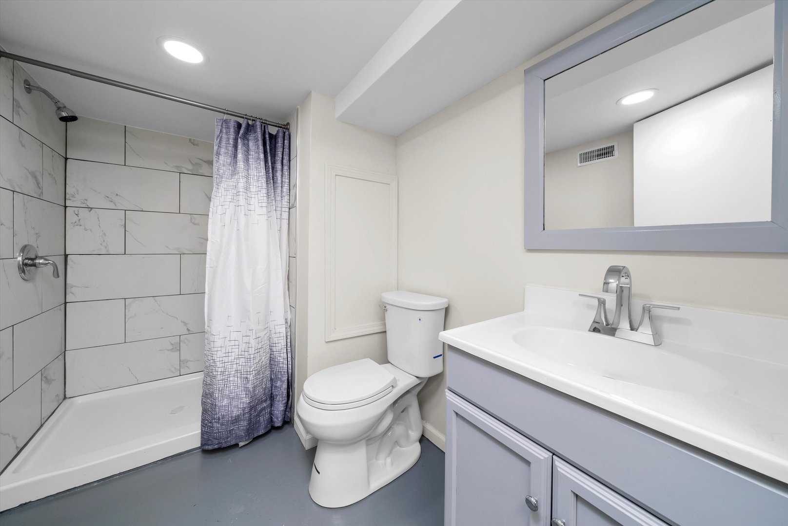 3227 South Wells Street, Unit COACHHOUSE Chicago, IL 60616 - Photo 19 of 20 a bathroom with a sink a toilet and shower