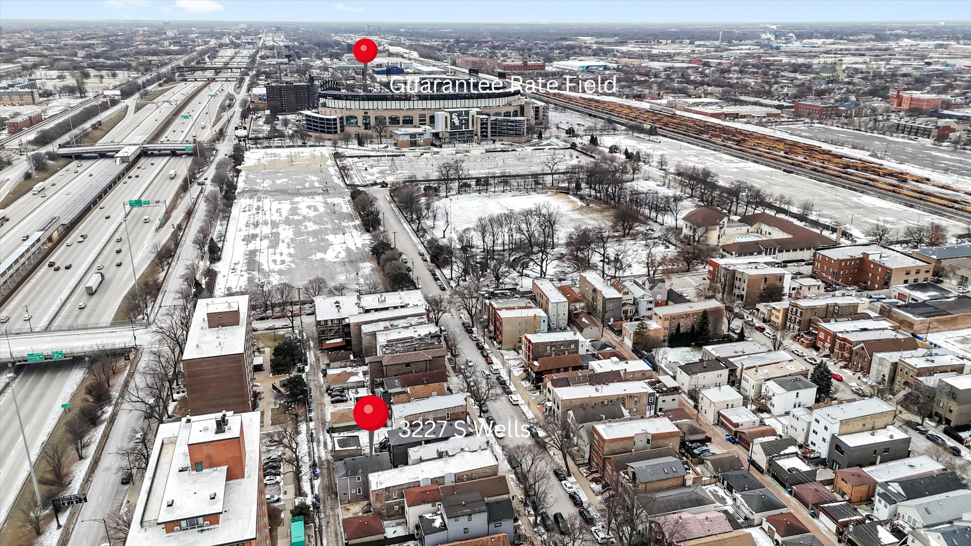 3227 South Wells Street, Unit COACHHOUSE Chicago, IL 60616 - Photo 4 of 20 an aerial view of a city