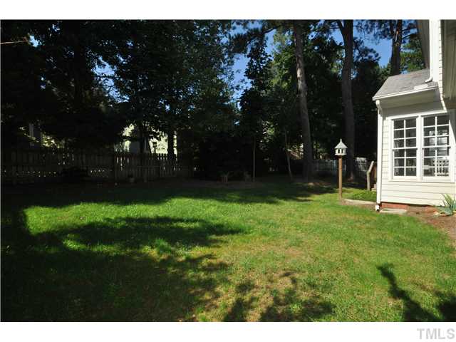 2901 Dahlgreen Road Raleigh, NC 27615 - Photo 15 of 17 a backyard of a house with lots of green space