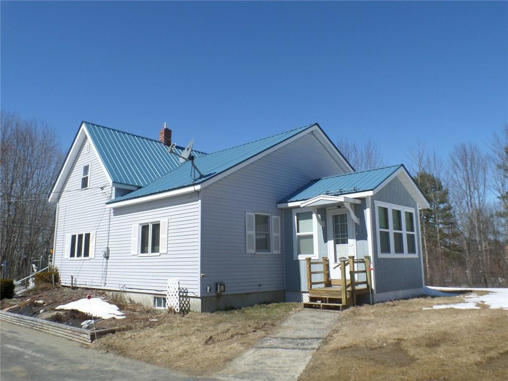 191 Birmingham Road Chelsea, ME 04330 - Photo 2 of 21 BACK ENTRANCE WITH ENCLOSED PORCH