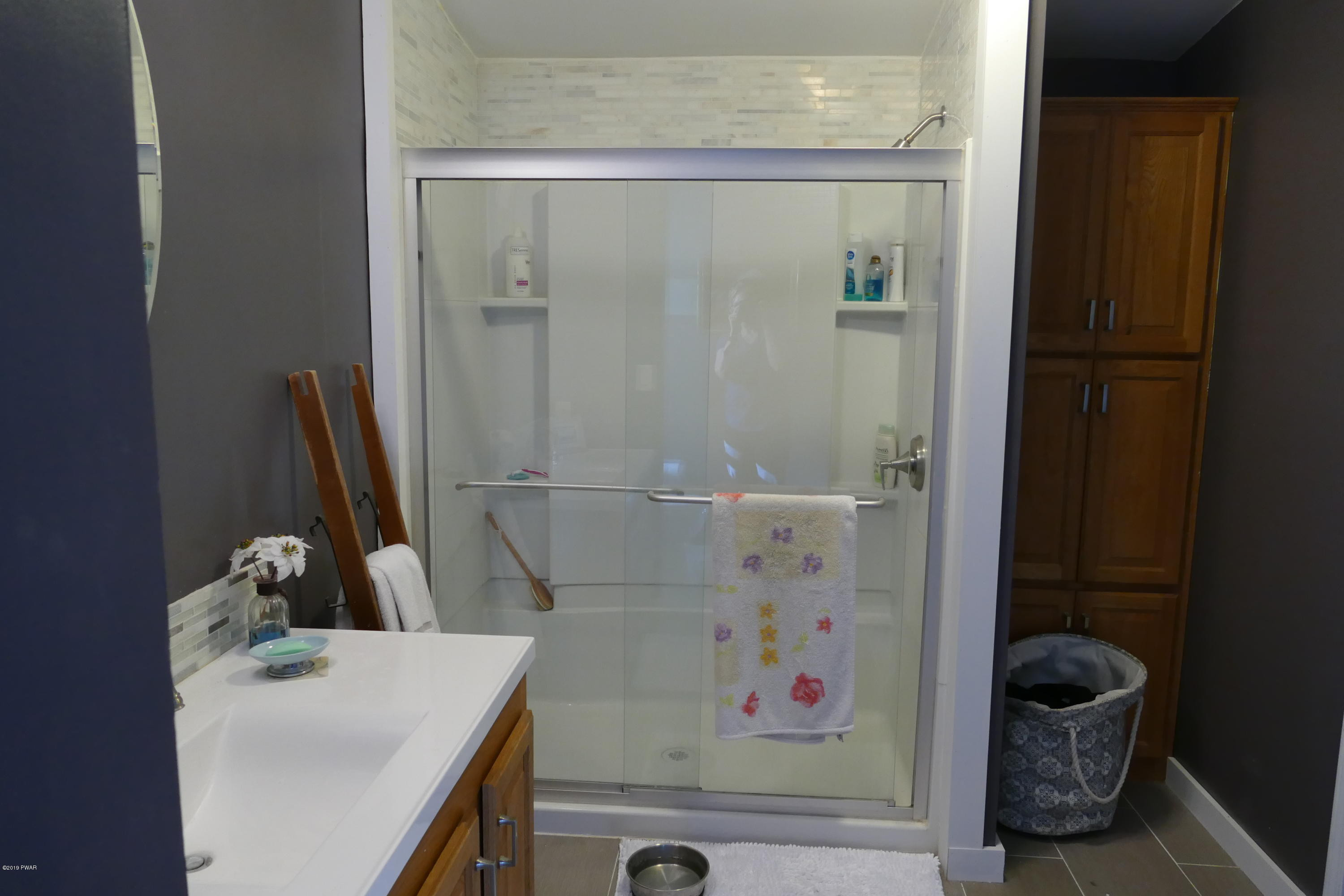108 Savitz Road Moscow, PA 18444 - Photo 36 of 46 a bathroom with a sink and a mirror