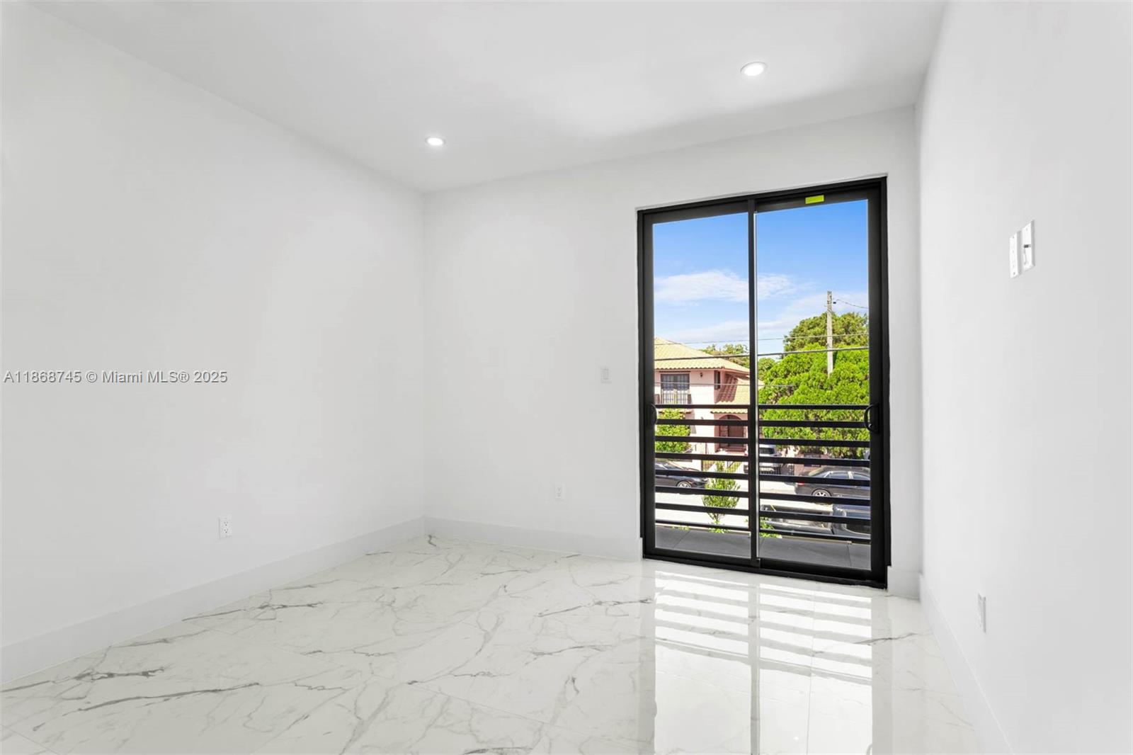 3430 Southwest 2nd Street Miami, FL 33135 - Photo 22 of 38 an empty room with windows