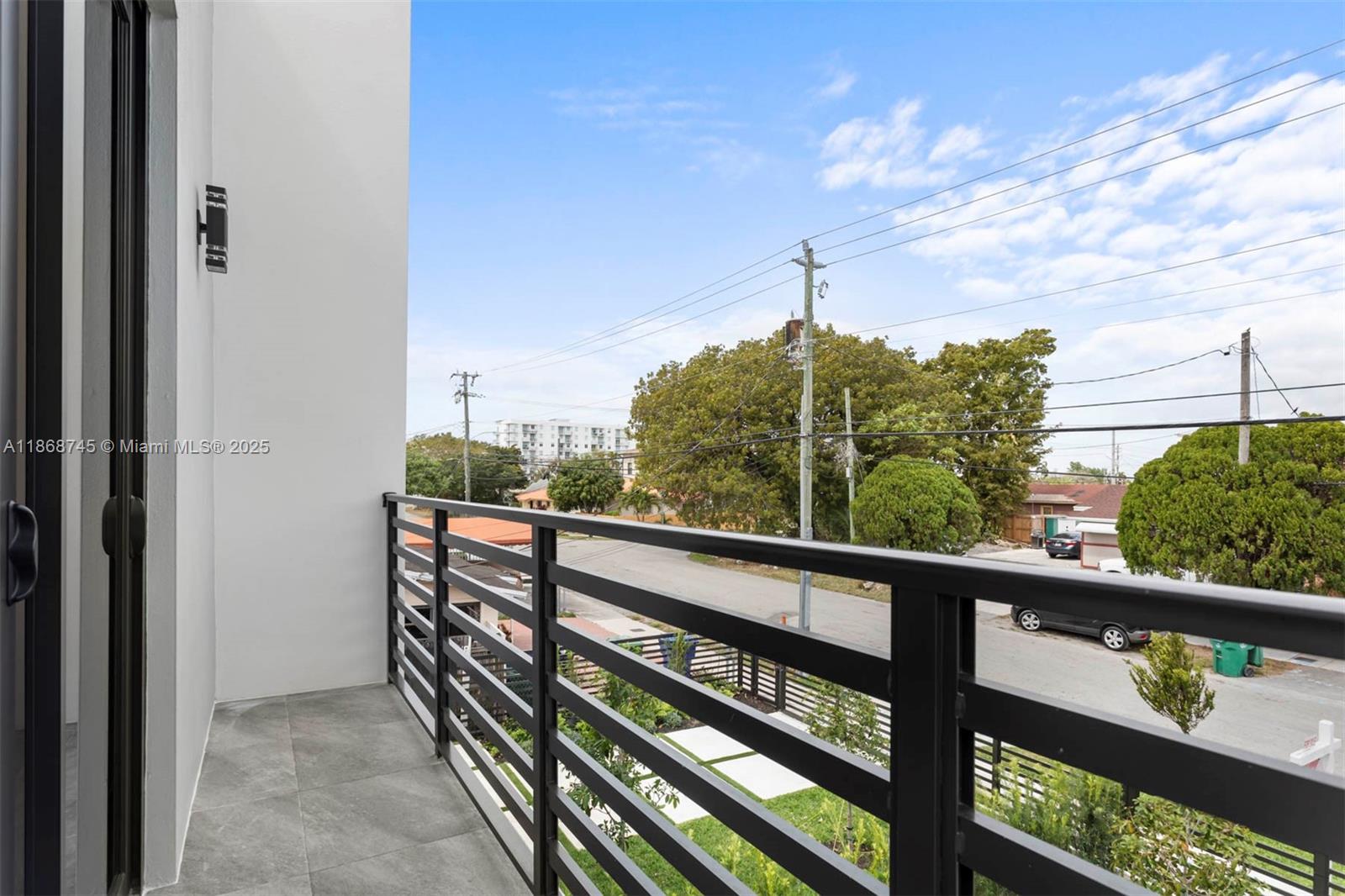 3430 Southwest 2nd Street Miami, FL 33135 - Photo 24 of 38 a view of a balcony with an outdoor space