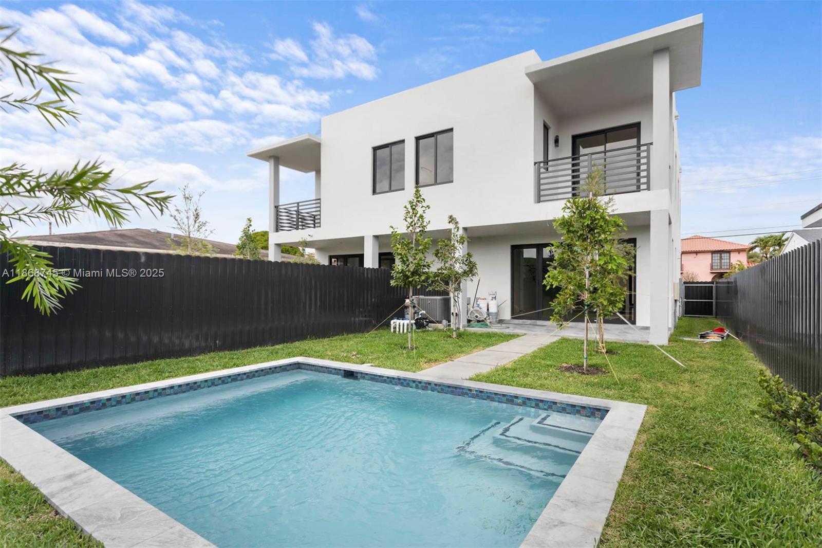 3430 Southwest 2nd Street Miami, FL 33135 - Photo 31 of 38 a view of pool with seating space